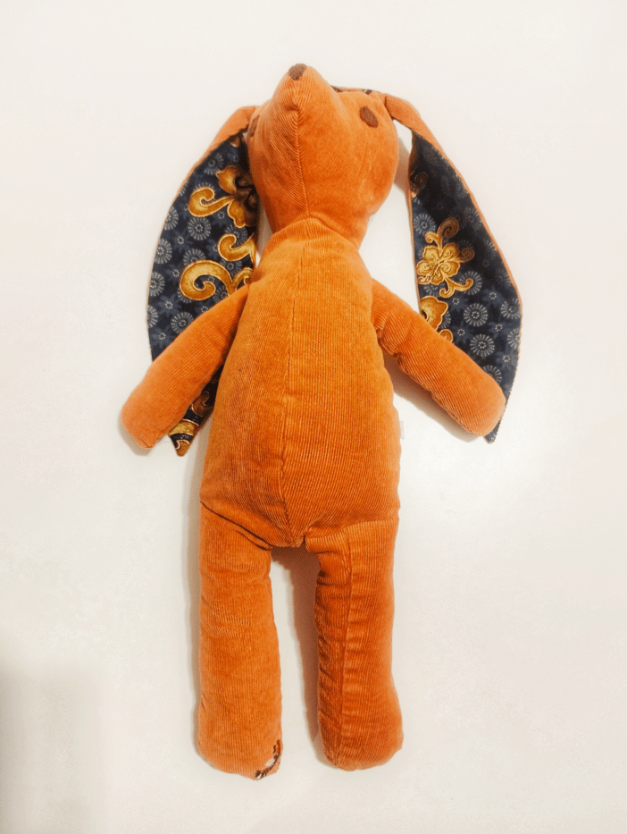 doudou lapin en velours milleraies couleur citrouille