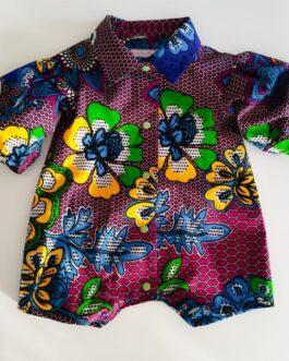 barboteuse pour bébé fille en tissu wax violet avec des motifs floraux