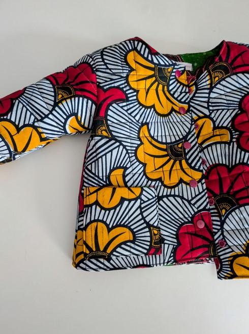 veste matelassée en wax imprimé fleurs de mariage
