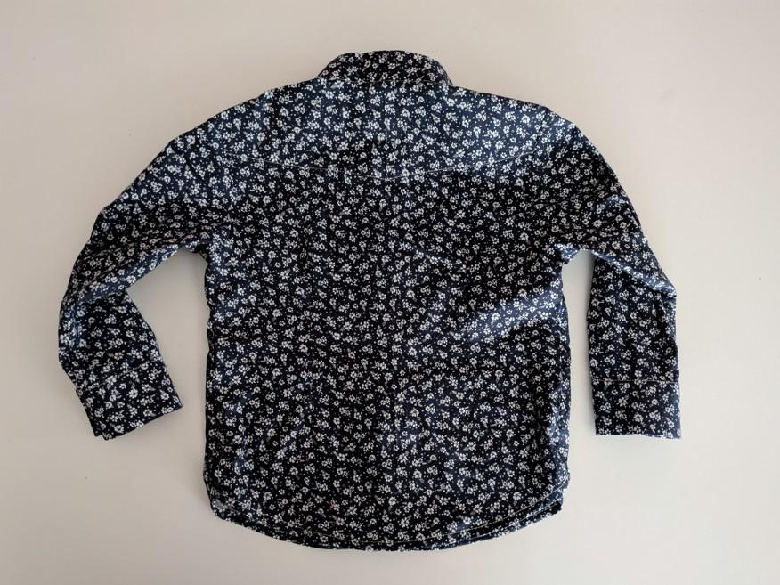 chemise imprimée à fleurs posée vue de dos à plat